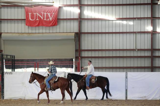 Las Vegas Sun sports editor Ray Brewer rides with UNLV rodeo coach Ric Griffith Nov. 2, 2012.
